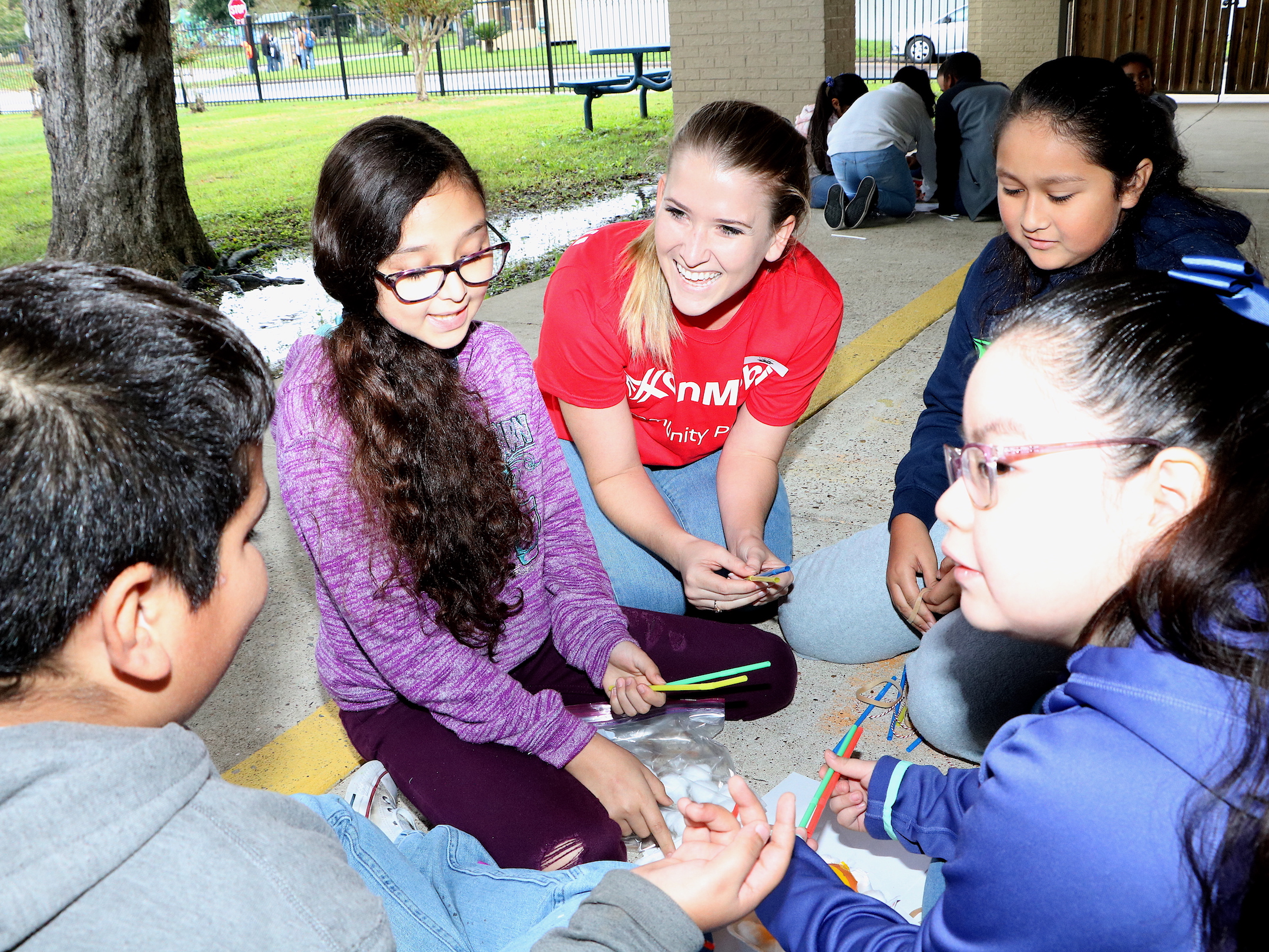 
Taylor Valentine (third from left) from ExxonMobil works with San Jacinto Elementary students (from left) Cory Garza, Fatima Figueroa, Gracie Escalante and Kelly Fuentes on STEM activities provided by ExxonMobil’s Global Organization for the Advancement of Latinos (GOAL).
