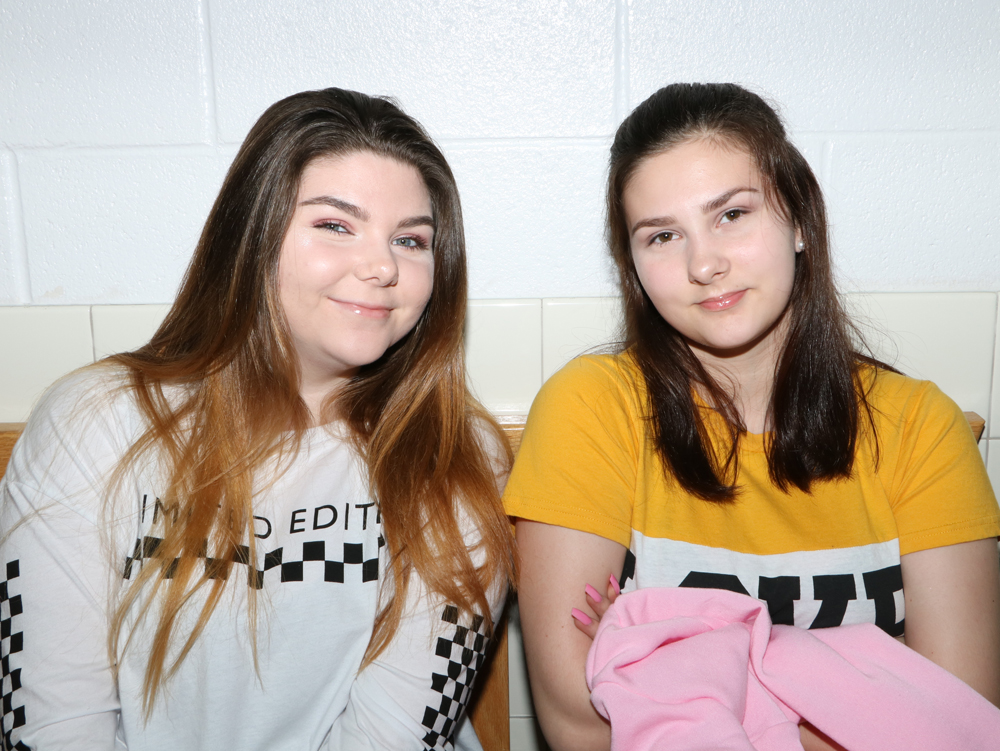 
Chance Brasuel, 11th grade, and Felicity Brasuel, ninth grade, wait to register on the first day of school at Goose Creek Memorial High School.
