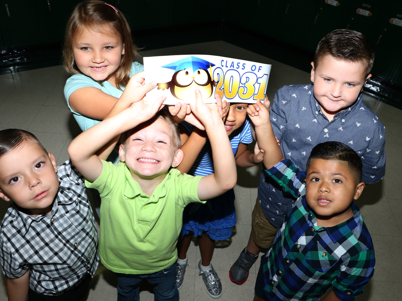 
Students from Rashida Bellard-Frank’s kindergarten class at B.P. Hopper Primary School proudly show that they are the Class of 2031.
Pictured are (front, from left) Dominic Poitras, Deaven Kambitsch, Aiden Ibarra, (back from left) Lexi Newton, Brooklyn Griffith and Luke Grubbs.
