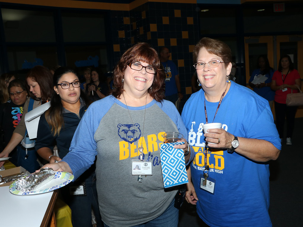 
Cedar Bayou Junior School’s Sherry Otahal (left), campus academic specialist, and Clark Haney, teacher, enjoy breakfast, provided by Baytown City Council Members Charles Johnson and Laura Alvarado, to celebrate the three STAAR distinctions CBJ received for Post Secondary Readiness, Closing the Gaps and Academic Growth.
