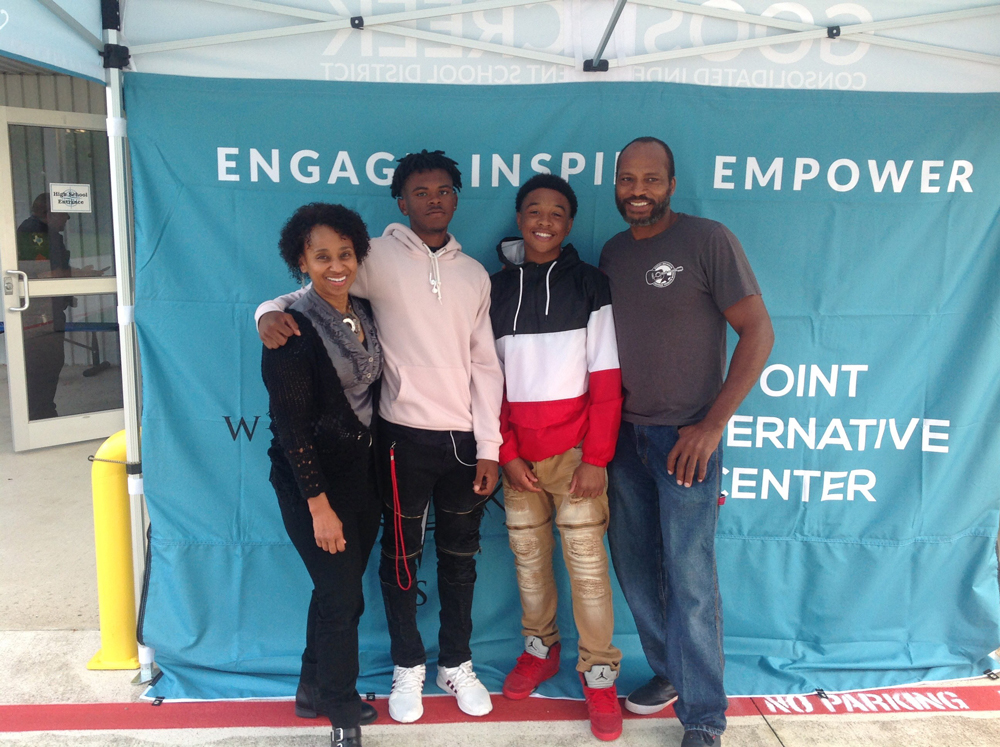 
Gabriel Butler (second from right), now at Goose Creek Memorial High School, and his family enjoy the POINT Open House.
