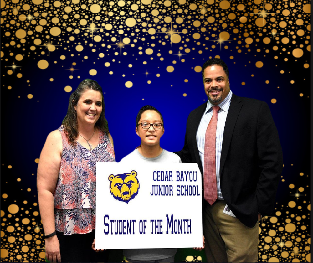 
Cedar Bayou Junior School’s October Student of the Month for sixth grade Oswaldo Garcia (middle) is congratulated by Rachel Vaughan (left), assistant principal, and Michael Curl, principal.
