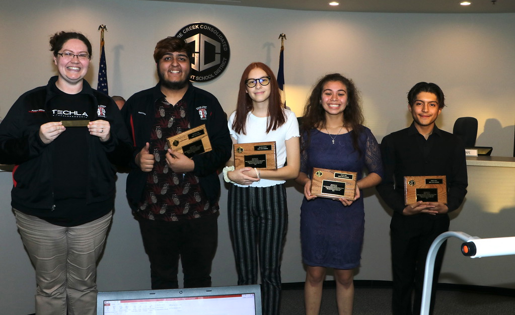 
Goose Creek Memorial High School students are recognized at a recent meeting of the Goose Creek CISD Board of Trustees for their awards from the 2018 TETA State Playwriting Competition.
Pictured are (from left) Alicia Green, teacher, who earned a School Bell Award; Christian Lewis and Melissa Herrera, both two-year TETA Playwriting Champions; Citlali Lara and Gabriel Baeza.
Not pictured are Nina Saunders, theatre teacher, who earned a School Bell Award; Sadie Aiken, two-year TETA State Playwriting Champion, and Jesus Torres.
