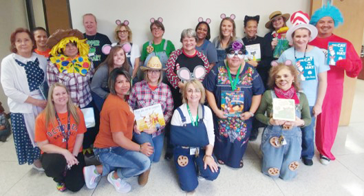
Faculty and staff at Hopper Primary School  dress up for the Character Book Parade, portraying characters from their favorite books.
