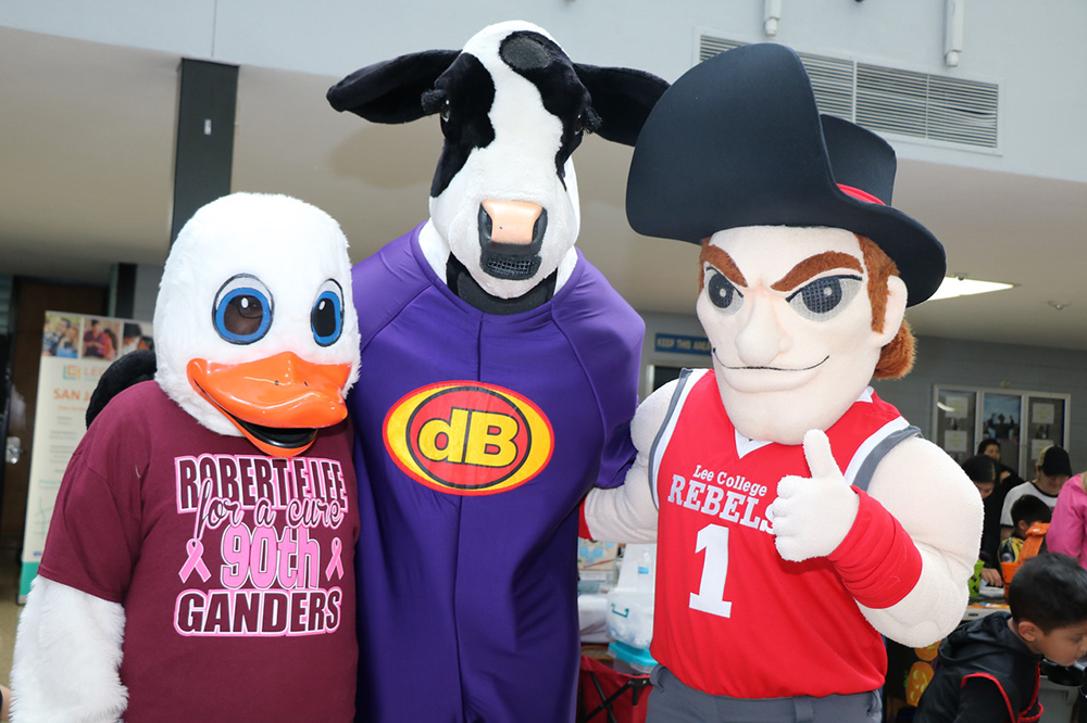 
Gary the Gander from Robert E. Lee High School, the Chick-fil-A Cow and Rooty the Rebel from Lee College team up at Goose Creek CISD’s recent Parent Resource Fair.
