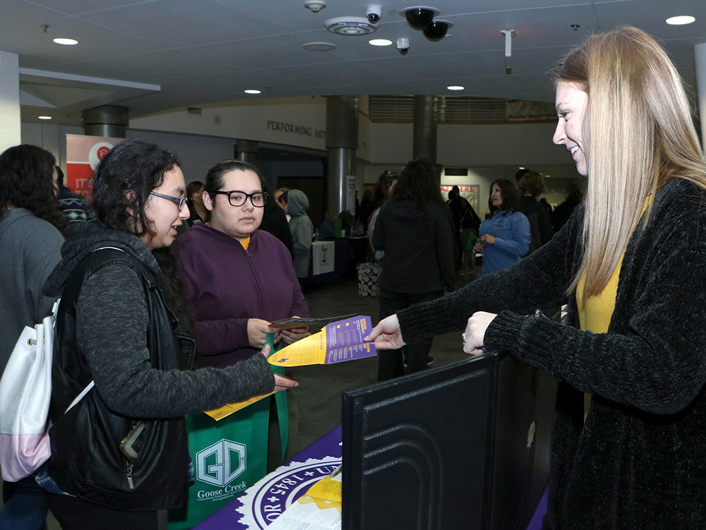 
Dayna Amezcua (left) and Jennifer Martinez from IMPACT Early College High School discuss opportunities with Abigail McPhail from the University of Mary Hardin-Baylor at the recent College Night held at Goose Creek Memorial High School.
