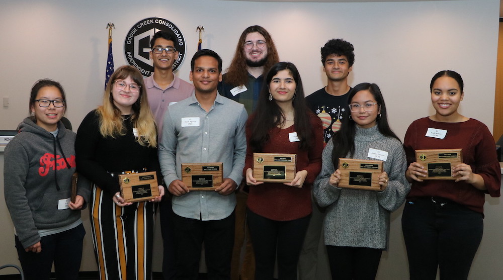 
Students who received the AP Scholar with Distinction Award for earning an average score of at least 3.5 on all AP Exams and scores of 3 or higher on five or more of these exams are recognized at a recent meeting of the Goose Creek CISD board of trustees.
Pictured are (from left) Jia Lin, Ashlyn Bernshausen, Kavish Pipalia, Ayush Agrawal and Brandon Ratliff from Ross S. Sterling High School and Shaily Yadav, Soham Datar, Athena Janobas and Kayla Baham from Goose Creek Memorial High School.
