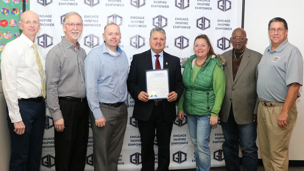 
Mayor Brandon Capetillo (middle) presents a proclamation for School Board Appreciation Month to Goose Creek CISD board members (from left) Pete Pape, president; Ricky Clem; Ben Pape; Jessica Woods, secretary; Howard Sampson, assistant secretary and Al Richard. Not pictured is Agustin Loredo II, vice president.
