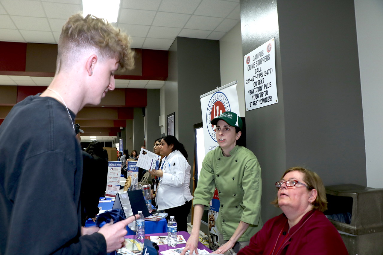 
Bailey Freeman (left), a junior at Robert E. Lee High School, talks with Chef Kylie Sobczak from Stuart Career Tech High School and Chef Ginger Zoidis from Robert E. Lee High School about the Culinary Arts program while attending the recent 7th Annual Career Night for all GCCISD students.
