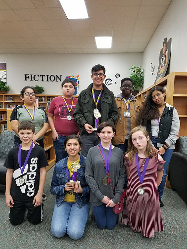 
Gentry Junior School participated in the recent Battle of the Books, a reading competition among all five Goose Creek CISD junior schools. Gentry’s seventh-grade team placed third, and the eighth-grade team won second place.
Pictured are seventh-graders (front, from left) Nathan Johnson, Gurveen Wahla, Dylan Davis and Trinity Pollard, and eighth-graders (back, from left) Leah Grimaldo, Sergio Cisneros, Alejandro Ojeda, Jonathan Reid and Evelinn Gutierrez. The teams were sponsored by Beth Ferguson, Gentry librarian.
