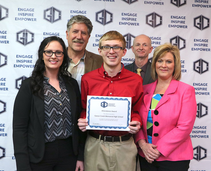 
Goose Creek Memorial High School is presented with the Attendance Award for having the highest high school attendance rate, 93.71 percent, for the fourth six weeks. Pictured are (from left) teacher Kristen Cannatella; Dr. Randall O’Brien, Goose Creek CISD superintendent; Jacob Kingsmill; Pete Pape, GCCISD board president and Susan Jackson, GCM principal.
