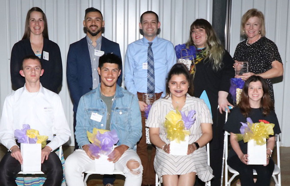 
Students (front, from left) Joshua Thompson; Justin Gonzales, Jr.; Brianna Herrera and Autumn Harris, all from Ross S. Sterling High School, honor their teachers (back, from left) Amy Albus, previously at Travis Elementary and now at Cedar Bayou Junior School and Mike Anzaldua, Bert Dunnington; Jennifer Henry and Brenda Fess, all from RSS, at the recent Students Choice Awards.  Not pictured are students Casey McCray from RSS, Zion Shillingford from RSS and teacher Ashlee Bellard Madison from Alamo Elementary.
