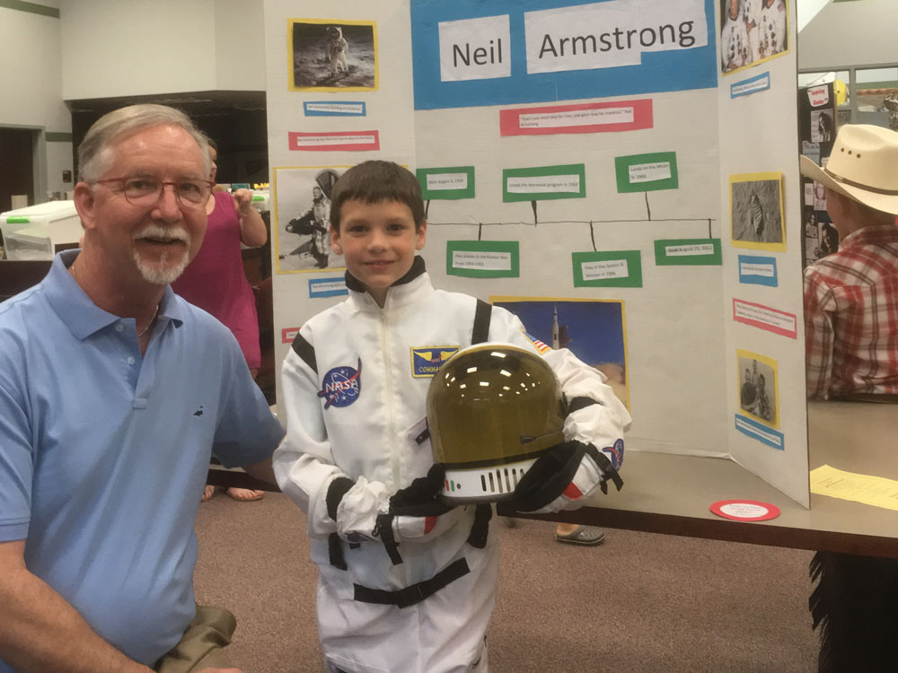 
Neil Armstrong, portrayed by William Spence, third grade, poses with Richard Clem, Goose Creek CISD board member, at the Wax Museum at Victoria Walker Elementary School’s GATE Showcase.
