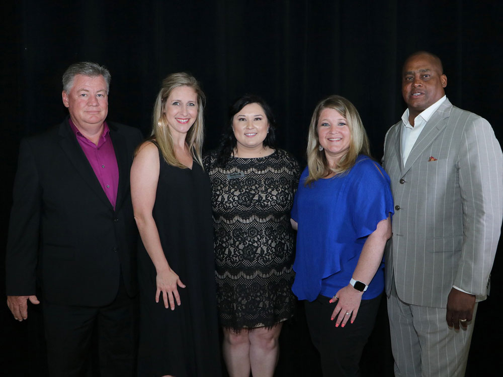 
Joe Grabo (left), Tesla McCawley (middle) and James Marion (right) from the Bayway auto Group – Bayshore Chrysler Jeep Dodge and Ram – arrange to present District Teachers of the Year
Angie Johnson (second from left) from Goose Creek Memorial High School and Anna West (second from right) from Victoria Walker Elementary with a car to drive from June 1 - August 31, 2019.

