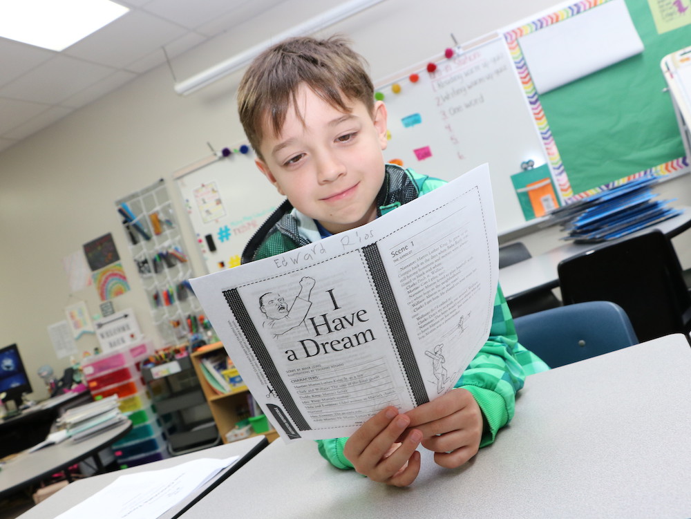 
Edward Rios, a fourth-grader in Megan Winemiller’s class at Travis Elementary, works on his lines for the play his class will perform in honor of Martin Luther King, Jr.

