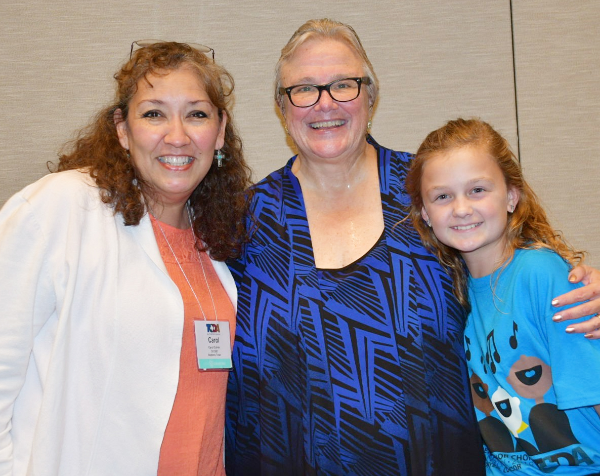 
Jaylee Anderson (right) is congratulated by Carol Colvin (left), music teacher at Stephen F. Austin Elementary, and Professor Ruth Dwyer, state director/conductor, on qualifying for the 2018 Texas Choral Director’s Association Elementary Honor Choir.
