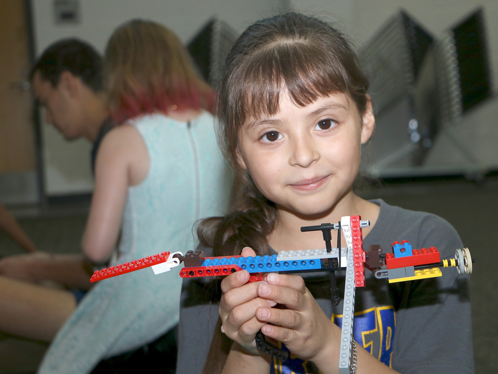 
Daniela Trujillo from Carver Elementary shows off her project at Lego Camp, one of Goose Creek CISD’s summer offerings for students.

