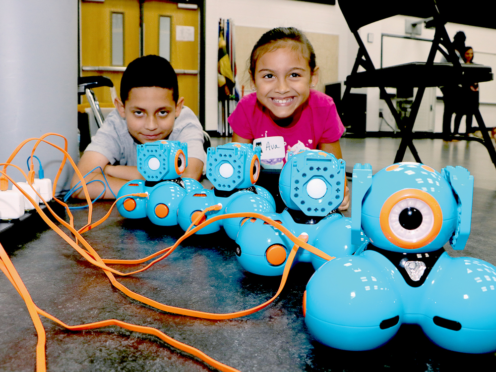 
Goose Creek CISD’s Summer Coding Camp provided an opportunity for Ethan Juarez (left) and Ava Flood from Stephen F. Austin Elementary to work with Battle Bots.
