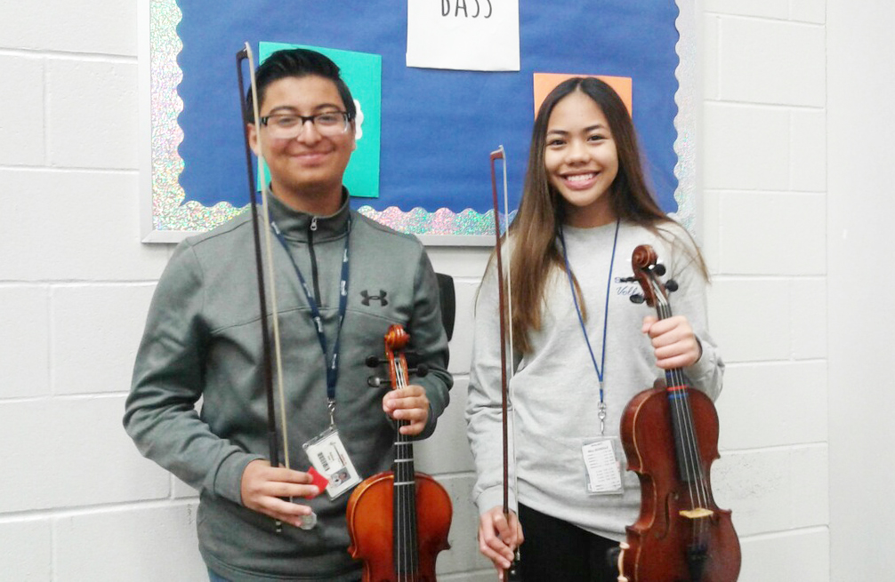  Ross S. Sterling first division Symphony Orchestra solo winners in the Region 19 6A Solo and Ensemble Contest are (from left) Alan Cantu-Salinas (violin) and Christel Vallagomesa (violin).The students are under the direction of John Yong.