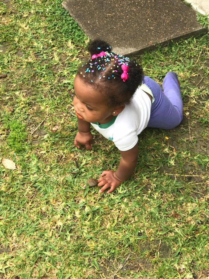 Harper Holt, daughter of  Crystal Holt, who works at Alamo Elementary, heads for an Easter Egg she spies on the ground at the annual Family Picnic and Easter Egg Hunt at the Peter E. Hyland Center.
