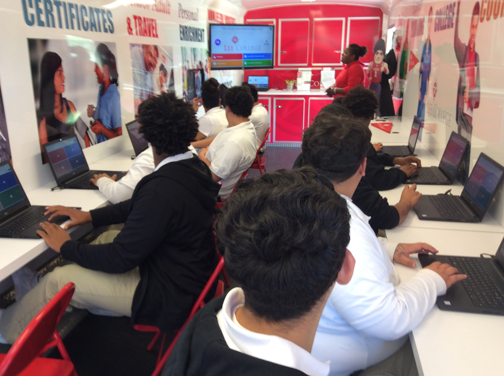  Keon Baldwin has the full attention of POINT Alternative students in the Mobile Go Center. 