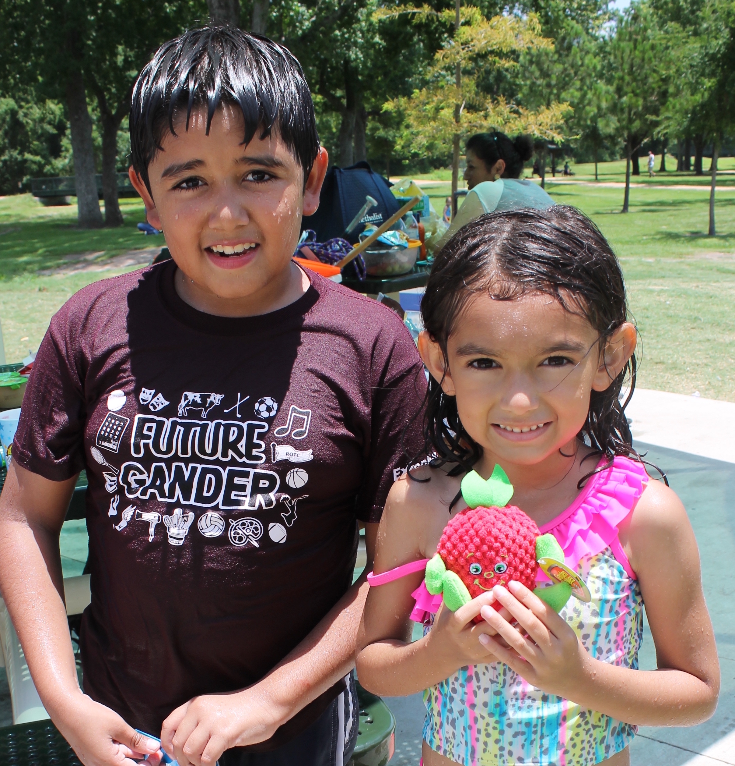 Cousins Alfredo Vega, 8, and Sofia Vega, 6, both won raffle prizes at the Summer Meals cookout at Jenkins Park June 15. The Summer Meals program provides nutritious meals for children ages 1-18. For more information, go to http://www.gccisd.net/page/FoodServices.SummerMeals.
