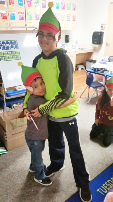 Nathan Mena (left), kindergarten student in Javona Jordan’s class at Bañuelos Elementary, enjoys working with his “buddy” Matthew Cobb, a 4th grader in Linda LeDay’s class.