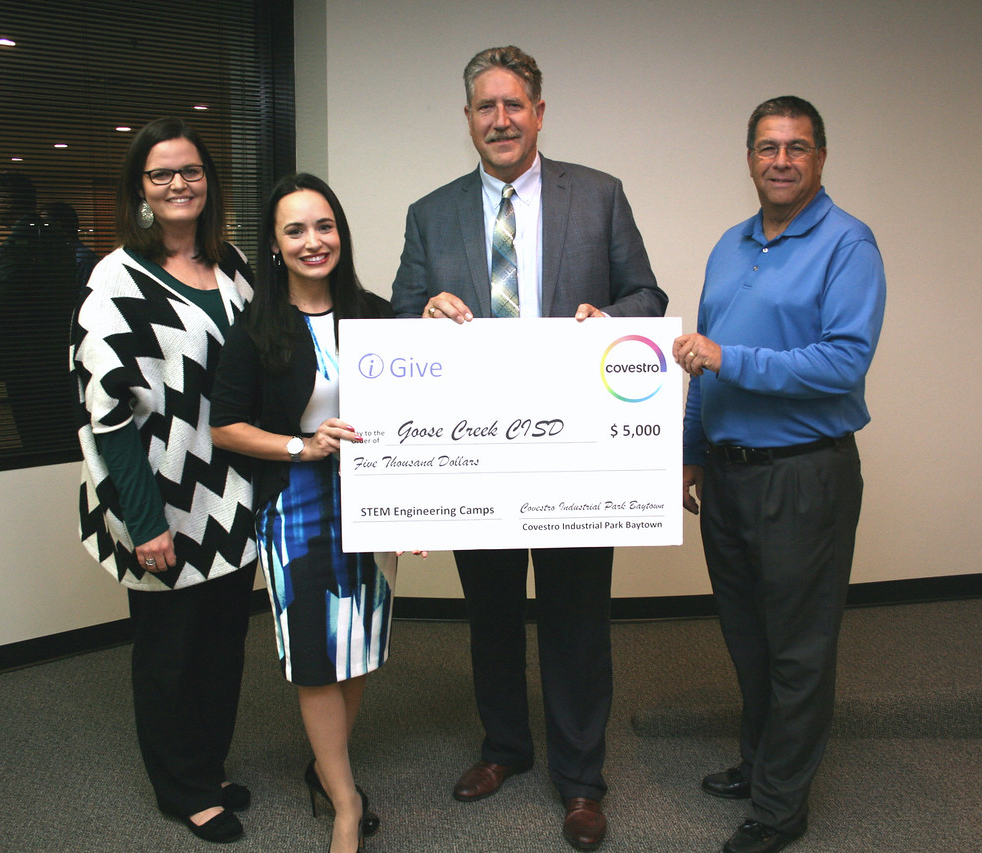 
Jennifer Walsh (second from left), head of communications at Covestro, presents a $5,000 donation for Goose Creek CISD STEM Engineering Camps at a recent meeting of the GCCISD board of trustees.
Pictured are (from left) Lindsey Marek, CTE specialist at Robert E. Lee High School; Walsh; Randal O’Brien, GCCISD superintendent and Al Richard, president of the GCCISD board of trustees.
