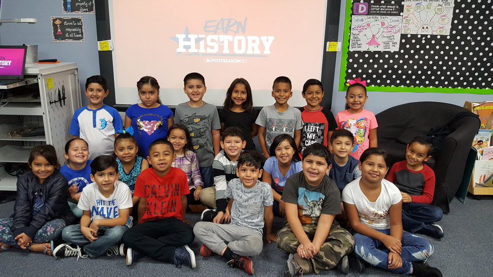  Mrs. Banda's class at De Zavala Elementary poses in front of an Astro's 