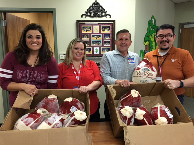  H-E-B donates 10 turkeys to Horace Mann Junior School for their faculty Thanksgiving dinner, since several HMJ staff members are still displaced due to Hurricane Harvey. The HMJ Band will play at the Grand Opening of H-E-B December 6.
Pictured are (from left) Erica Tran, HMJ principal; Kim Kelly, H-E-B community coordinator, Gary Schmalfeldt, H-E-B unit director and Jose Chaidez, HMJ assistant band director.
