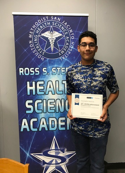  Christopher Amezcua, a senior at Ross S. Sterling High School, shows the certificate he received in recognition of his scores on the AP Biology Exam and two Project Lead The Way End of Course assessments. He is in the Health Science Academy at Sterling.
