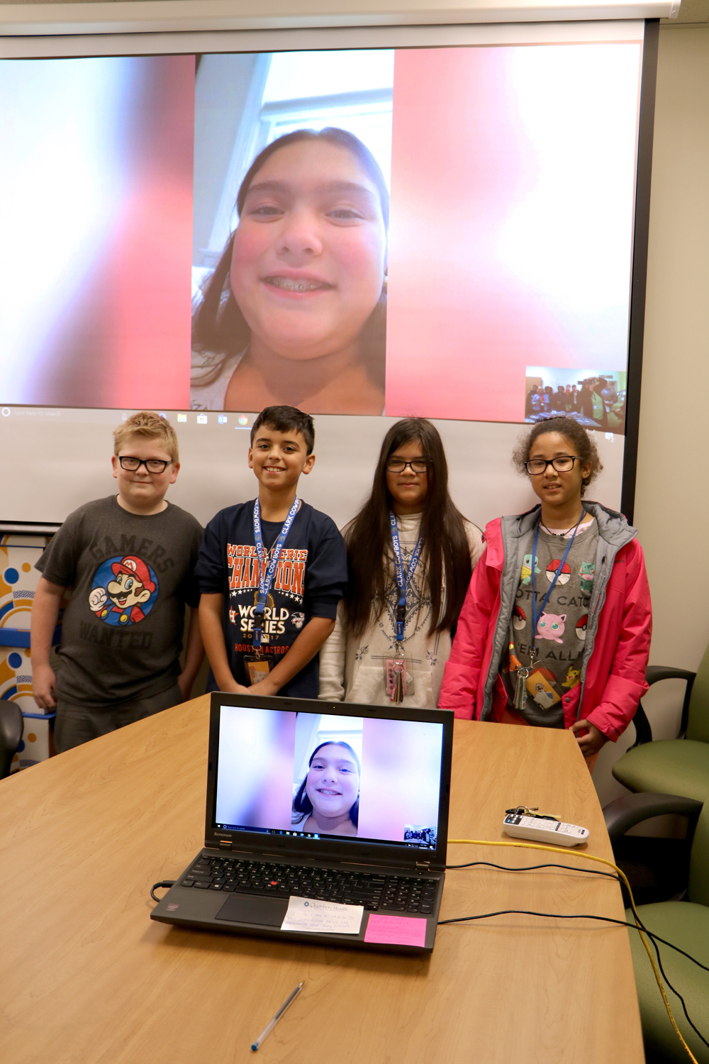  Clark Elementary fifth graders Waylon Stoerner, Major James, Anna Flores and Idaylia Larkin held a skype session with Delaney Posehn, (pictured on screen), a fifth grader from New Jersey who took up a collection for school supplies for Clark students. 