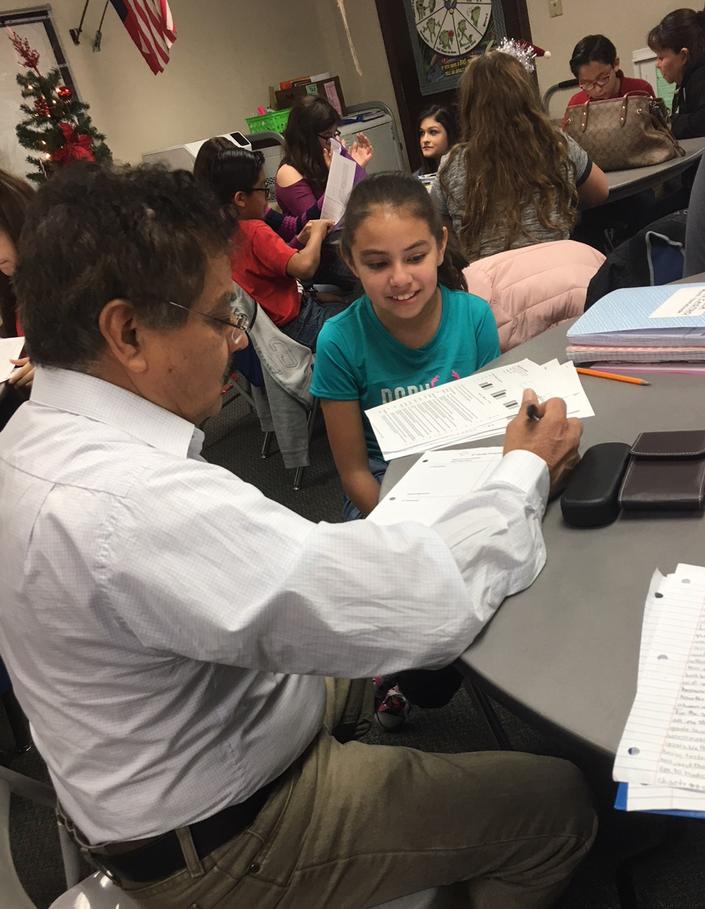 
Marbella Reyes (right) sets some goals with her father Marcos Reyes during Crockett Elementary’s recent Student Led Conferences. The conferences provided an opportunity for students to lead parents, district administrators and community members through discussions about their work and to establish academic and social goals.
