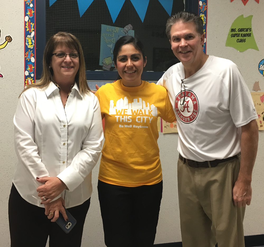 
Elma Villanueva, assistant principal at Carver Elementary, Priscila D. Garza, healthy community school coordinator and Bart Cobb, Carver principal, are pleased with the results of Carver’s YMCA Walking Group after its accomplishment of walking a marathon in eight weeks. The program is part of the CATCH (Coordinated Approach to Child Health) curriculum, piloted by four GCCISD schools to promote health in the community.
