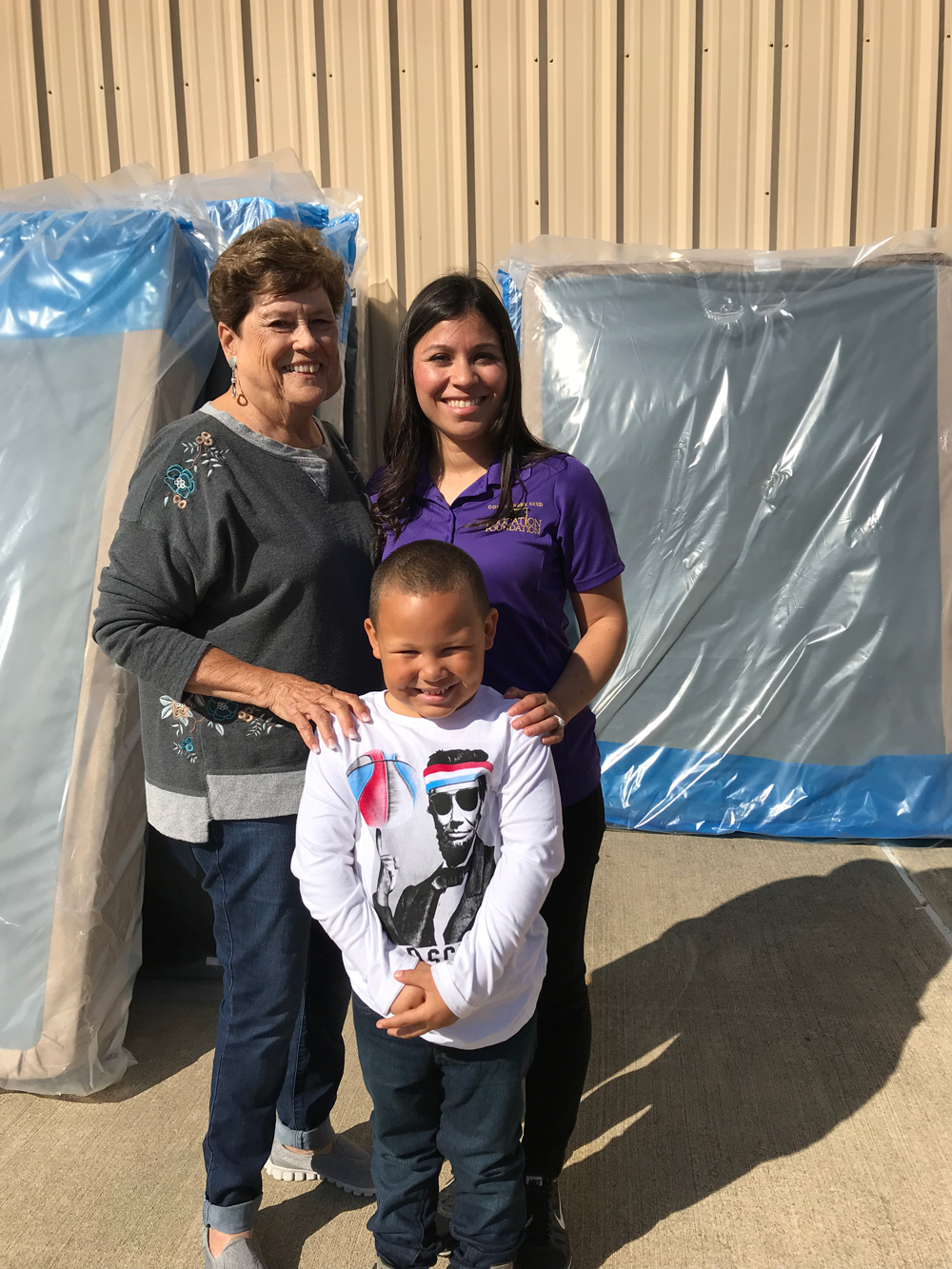 
Sandra Bell (left), vice president of marketing and events for the Goose Creek CISD Education Foundation, and Erika Foster, GCCISD Education Foundation director, pose with Landyn Messer, kindergarten student at Hopper Primary School, as he prepares to select some bedding to go with his new mattress. This is the second mattress giveaway, organized by the Education Foundation and held at the GC Service Center, for GCCISD students and employees with students in GC schools. Donations to GCCISD for Harvey relief efforts were given to the Foundation to help those recovering from the effects of Harvey.
