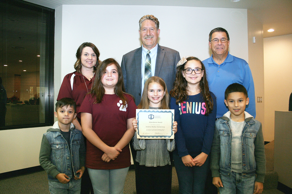 
Victoria Walker Elementary is recognized at a GCCISD board meeting as one of two elementary schools with the highest attendance rate for the second six weeks at 97.52 percent. Pictured are students (front, from left)
Braylen Rodriguez, Camila Garza, Kayden Johnson, Daniela Garza, Pablo Rodriguez, (back, from left) Monica Juarez, principal; Randal O’Brien, GCCISD superintendent and Al Richard, GCCISD board president.
