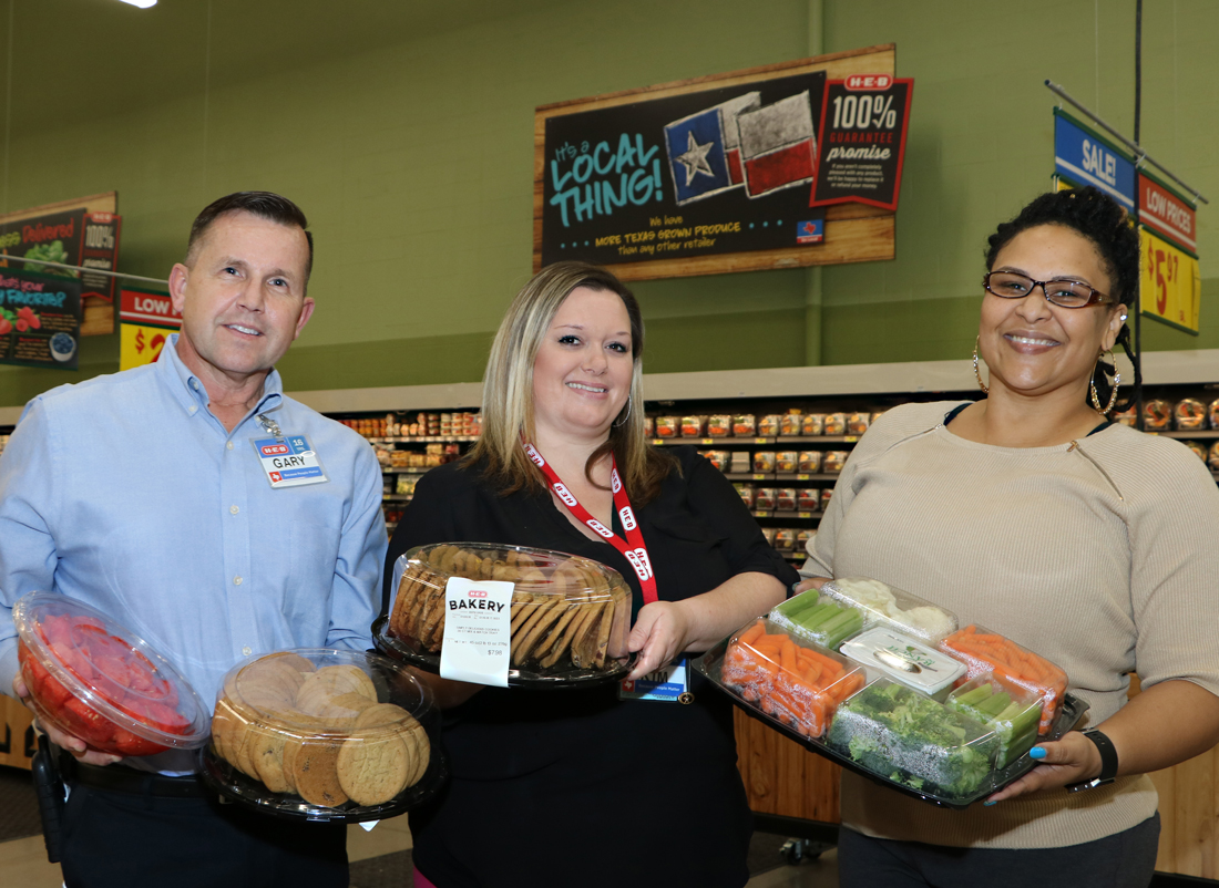  Gary Schmalfeldt (left), H-E-B unit director, and Kim Kelly (middle), H-E-B community coordinator, look at some of the food options for the hospitality room they will sponsor for business partners and volunteers at Goose Creek CISD’s upcoming 6th Annual Career Night Tuesday, January 16, from 6 to 8 p.m. in the Ross S. Sterling High School Commons.
