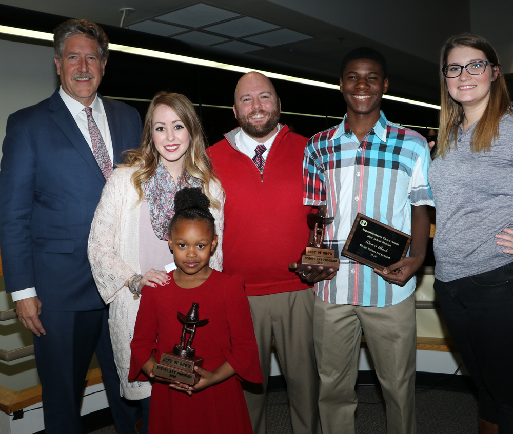 
Randal O’Brien (back left), Goose Creek CISD superintendent, and Phillip Morgan (middle), director of fine arts, congratulate Houston Livestock Show and Rodeo School Art Contest winners (front) Madison Kibbles, kindergartner at Dr. Johnny T. Clark, Jr. Elementary School under the direction of art teacher Molly Barr, Elementary Best of Show, and Daron Bush, 11th grade at Goose Creek Memorial High School under the direction of art teacher Brandi Aguilar, High School Best of Show. Not pictured is Yazli Gonzales, 8th grade at Gentry Junior under the direction of art teacher Jennifer Martin, Junior School Best of Show.
