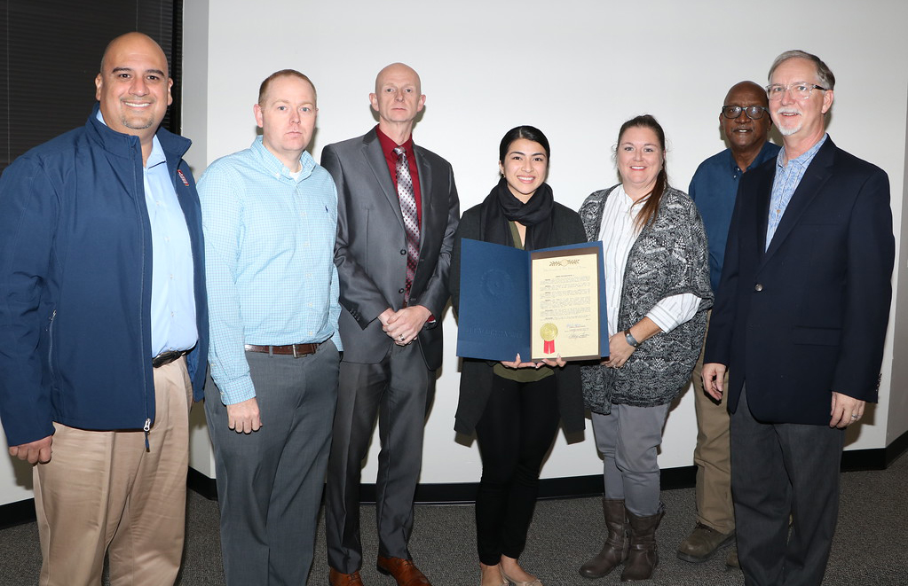 
Elsa Mendoza from the office of Senator Sylvia Garcia, presents the Goose Creek CISD Board of Trustees with a Proclamation for School Board Recognition Month. Pictured with Mendoza are (from left) board members
Agustin Loredo III, vice president; Ben Pape; Pete Pape, president; Jessica Woods, secretary; Howard Sampson, assistant secretary, and Ricky Clem. Not pictured is Al Richard.
