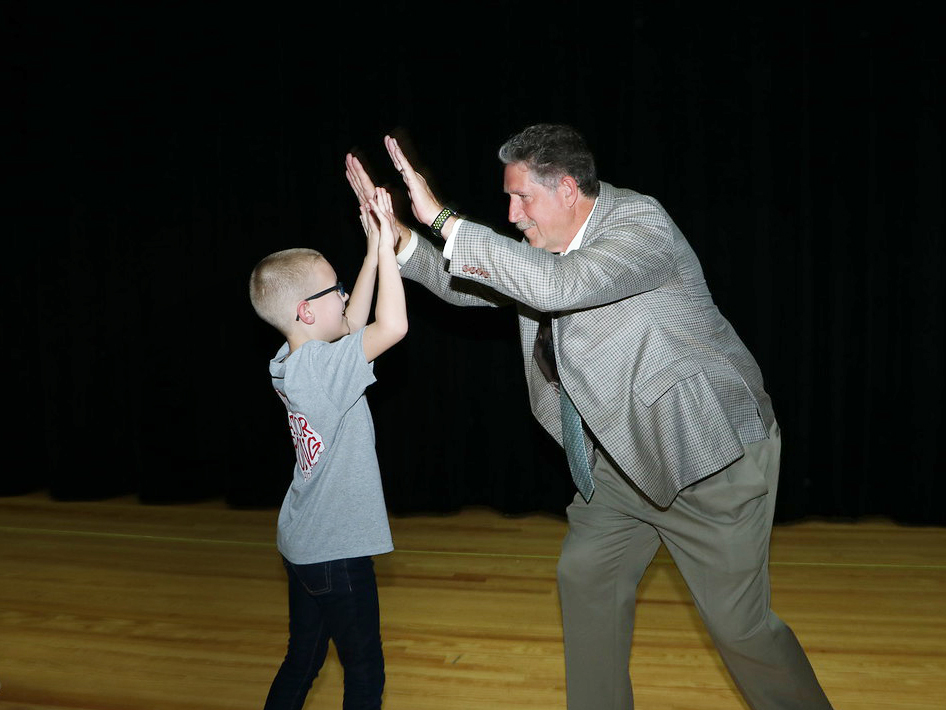 
Randal O’Brien, Goose Creek CISD superintendent, greets second-grader Brady Henrichsen from Austin Elementary as he comes to the stage at Sterling High School to accept his UIL medal for Creative Writing.
