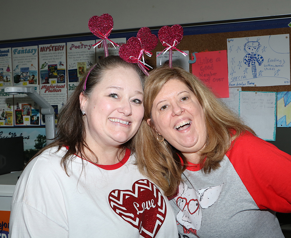 
Wendy Thompson and JoAnn Finley, fourth grade teachers at Crockett Elementary, prepare to enjoy Valentine’s Day with their students.
