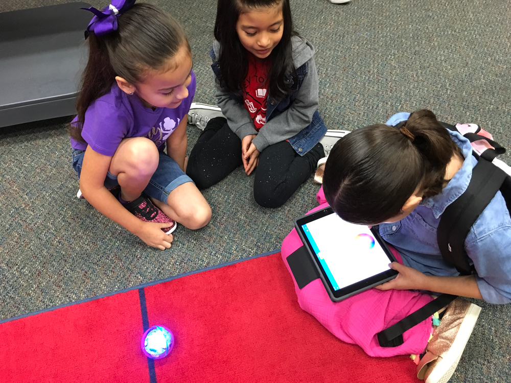 
Ava Flood, Sarah Ojeda, and Audrey Jaime from Stephen F. Austin Elementary code a Sphero for a perimeter lesson.
