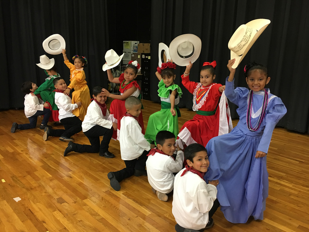 
Photo by Margaret Ehlig
San Jacinto Elementary celebrated Cinco de Mayo with a performance by Cristobal Paz, Melissa Matamoro, Abraham Deltoro, Natalie Alvarez, Miguel Rodriguez, Analia Garcia, Ruben Rodriguez, Yanelly Alvarez, Edwin Mejia, Dannely Coronado, Cristian Ramirez and  Ariana Medina, first-graders from Norma Garcia’s class.
