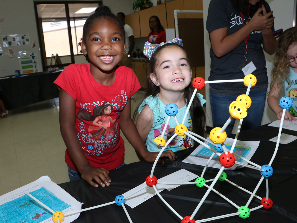  Skylar Hicks (left)  and Dalilah Sanchez from B. P. Hopper Primary get creative during the recent GATE Showcase.
