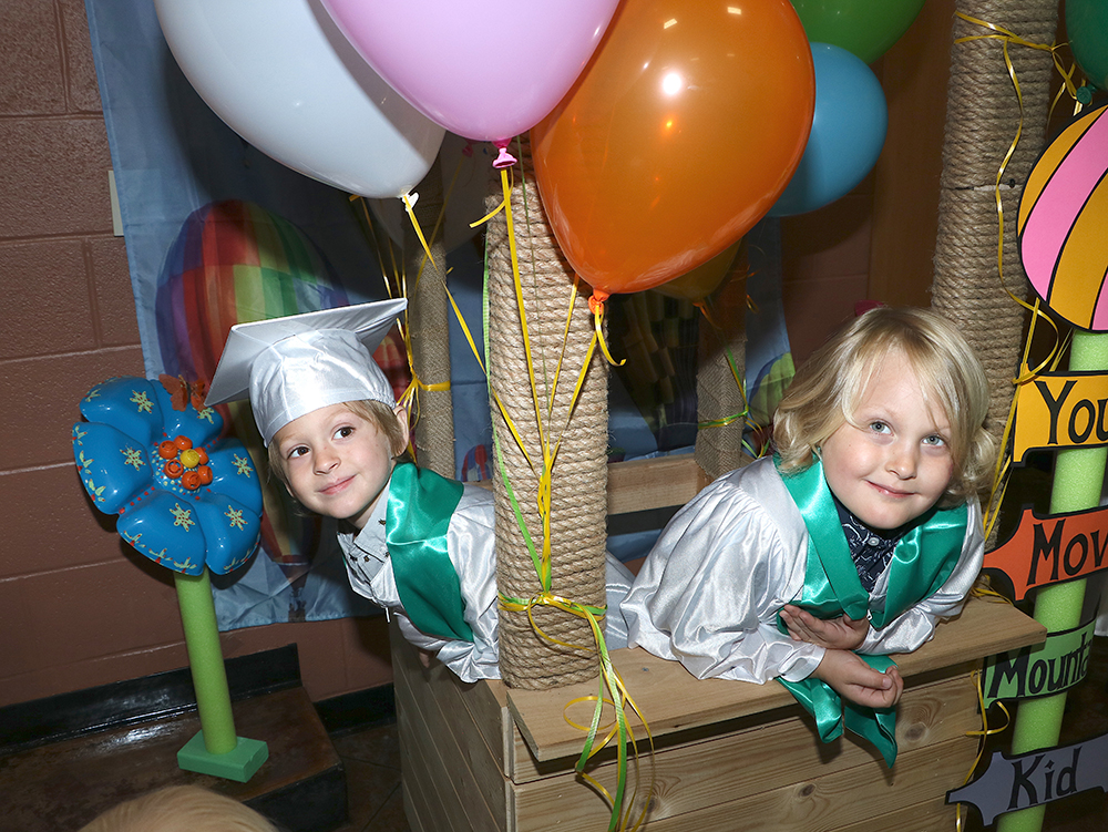 
Jakob Johnson (left) and Jonah Johnson are ready to soar to new heights after their pre-kindergarten graduation ceremony at Peter E. Hyland Center.
