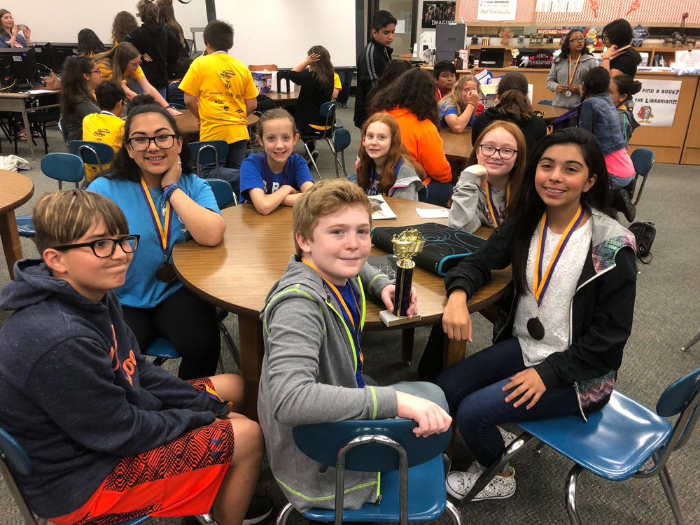 
Cedar Bayou Junior School sixth-grade students won the Battle of the Books District Championship held at Gentry Junior School, competing against the four other Goose Creek CISD junior schools. Pictured are participants (front) Aaron Avant, (from left) Nickolas Rodriguez, Faith Hutchinson, Reese Benoit, Hanna Coker, Makenzie Brasfield and Leina Cantu. Aaron, Faith, Makenzie and Leina won the district trophy and a medal.
