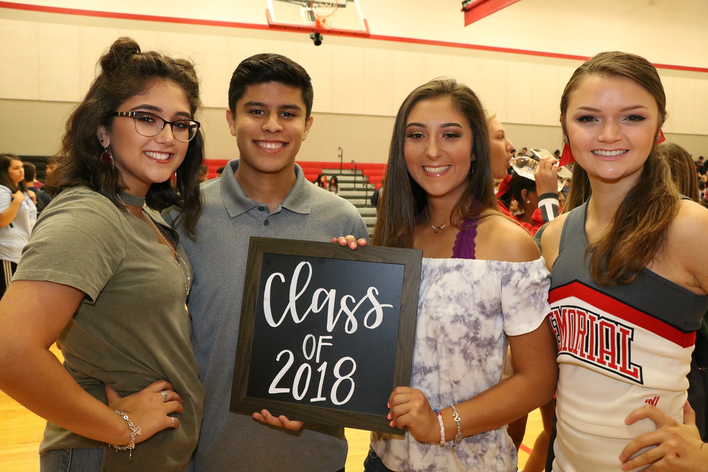 “(from left) Torie Gonzalez, Hector Diaz, Savannah Minton and Courtnee Lambright wait for their schedules in the gym at GCM on the first day of their senior year.