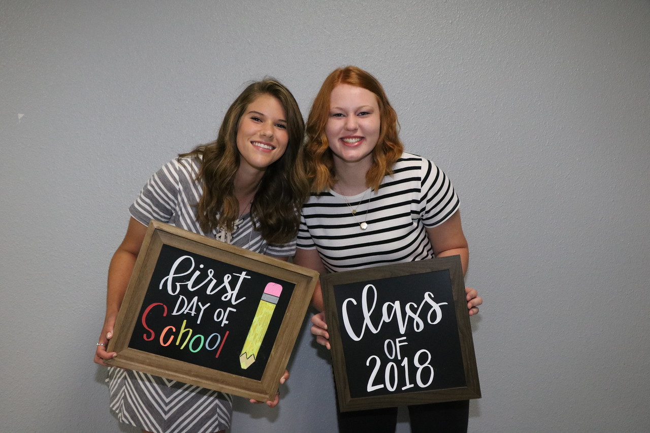  Bryn Benoit (left) and Megan Clausen enjoy the first day of their senior year at Ross S. Sterling High School. 