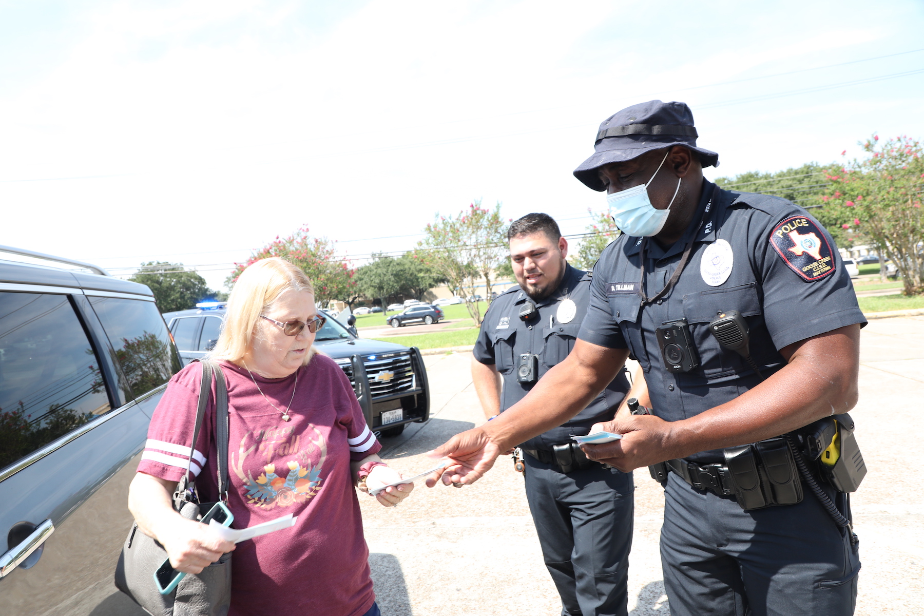 goose creek officer gives out certificate to citizen following guidelines