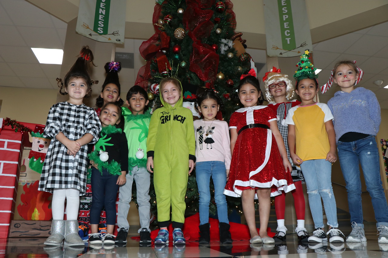 Students pose in christmas attire